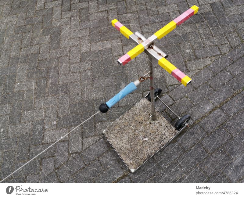 Stretcher self-built bracket for tensioning a steel cable as a barrier in front of a courtyard entrance in Oerlinghausen near Bielefeld on the Hermannsweg in the Teutoburg Forest in East Westphalia-Lippe