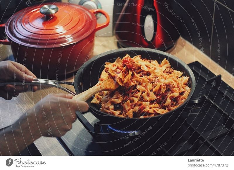 Pasta being prepared in a pan food cooking meat meal vegetable dinner cuisine dish kitchen cooked healthy plate onion closeup fresh vegetables pasta italian