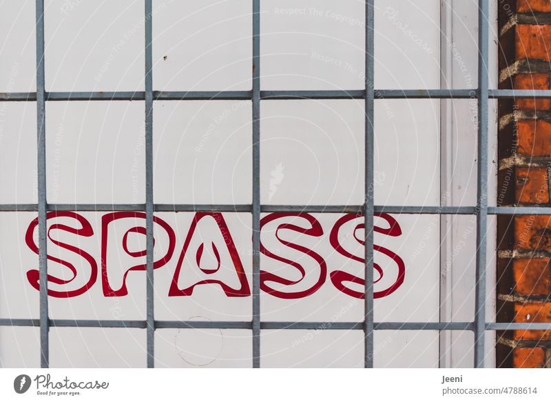 Here you have real fun Joy Happiness Happy Window Grating behind bars Converse antagonism Word Wordplay Irony Joie de vivre (Vitality) Red writing