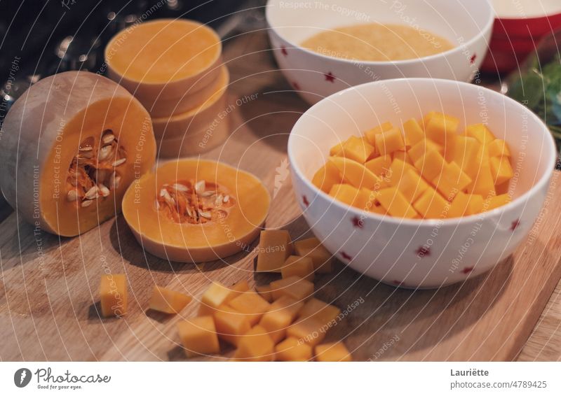 Pumpkin chopped in small cubes bowl meal healthy white orange sweet dish dinner yellow pumpkin diet lunch isolated fruit plate healthy eating no people