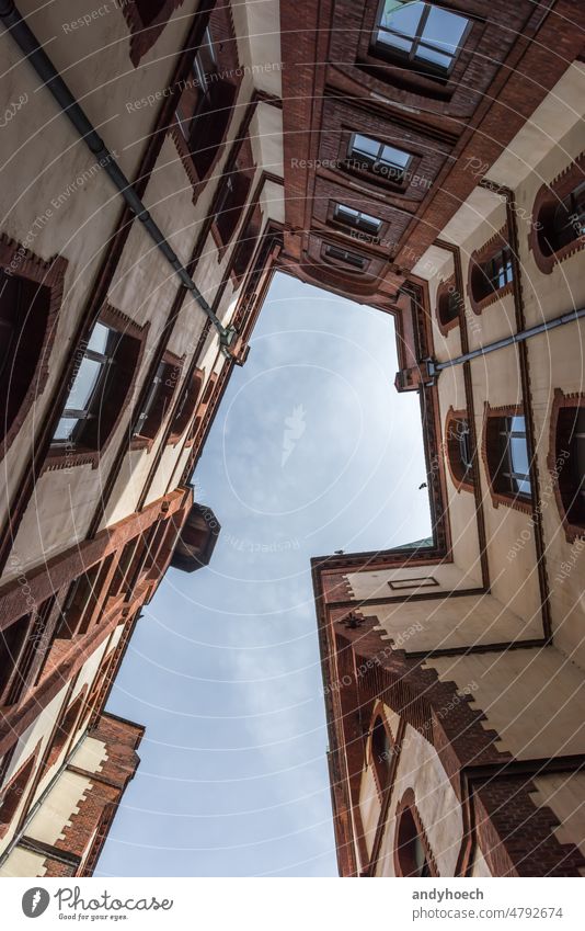 A courtyard in the port city of Hamburg above architecture attraction brick bricks building cityscape day design destination district downtown europe european