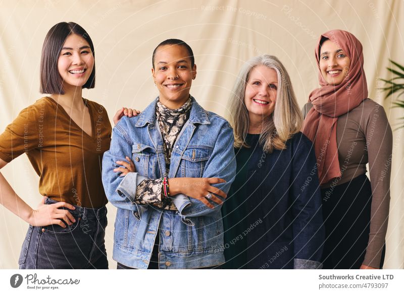 International Women's Day portrait of cheerful multiethnic mixed age range women smiling towards the camera international womans day smile happy look confident