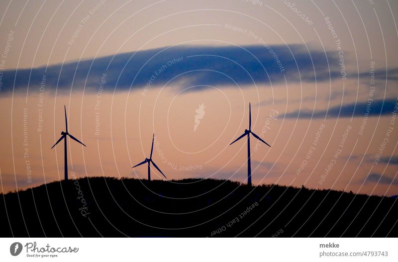 Without wind comes the dawn Pinwheel windmills Hill Twilight Wind wind power Renewable energy Wind energy plant Eco-friendly Environmental protection