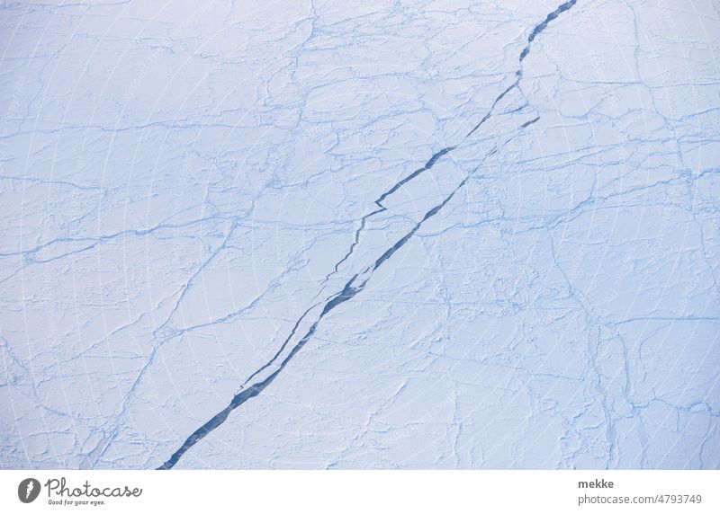 Crack in the ceiling Sea ice Ice ocean The Arctic Arctic Ocean arctic Expedition Snow Crack & Rip & Tear lead Ice floe compact North Cold chill Winter