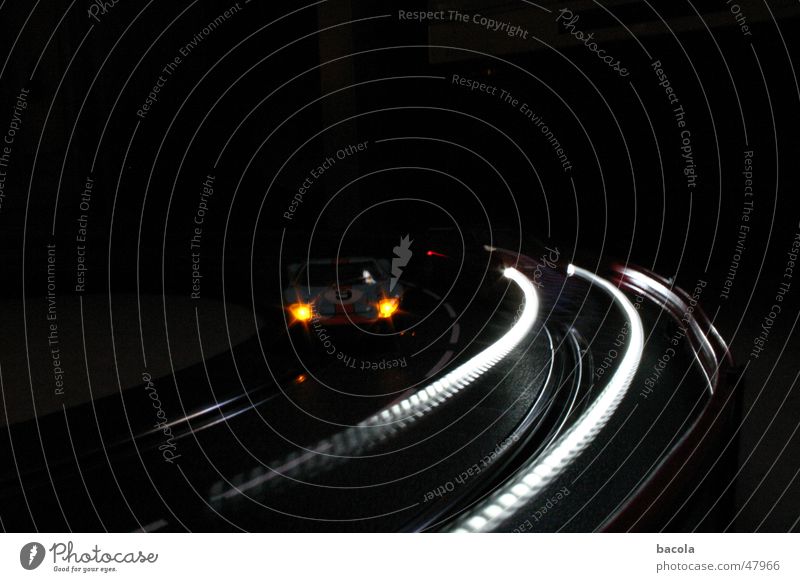 Carrera at night Model racecourse Light Car race Speed Dark Racecourse Floodlight Street Curve Traffic infrastructure Oncoming traffic Model car Toy car