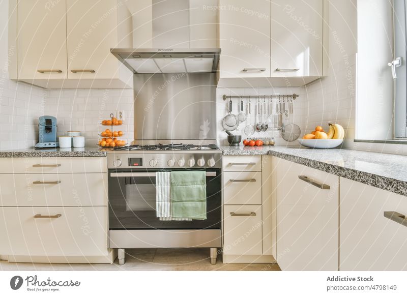 Modern Appliances In New Kitchen Apartment Stock Photo