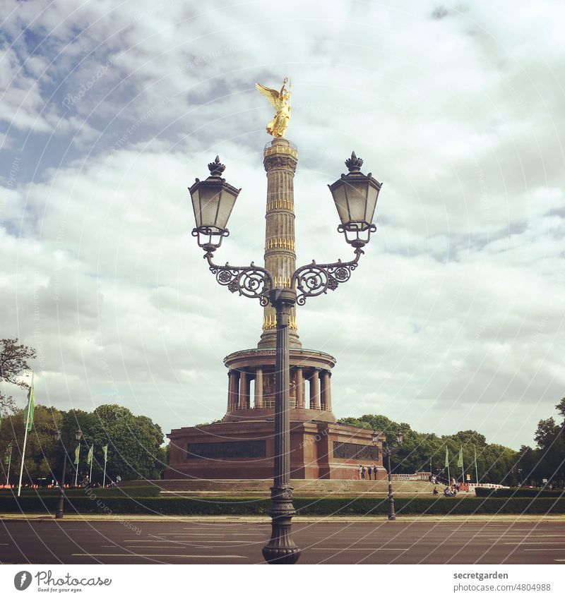 [hansa BER 2022] In search of Zettberlin found only the Victory Column. Victory column Berlin Street lighting streetlamp Road traffic Gold Brown Green Sky