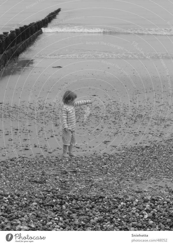 girl on the beach Girl Child Beach Ocean England Water Stone