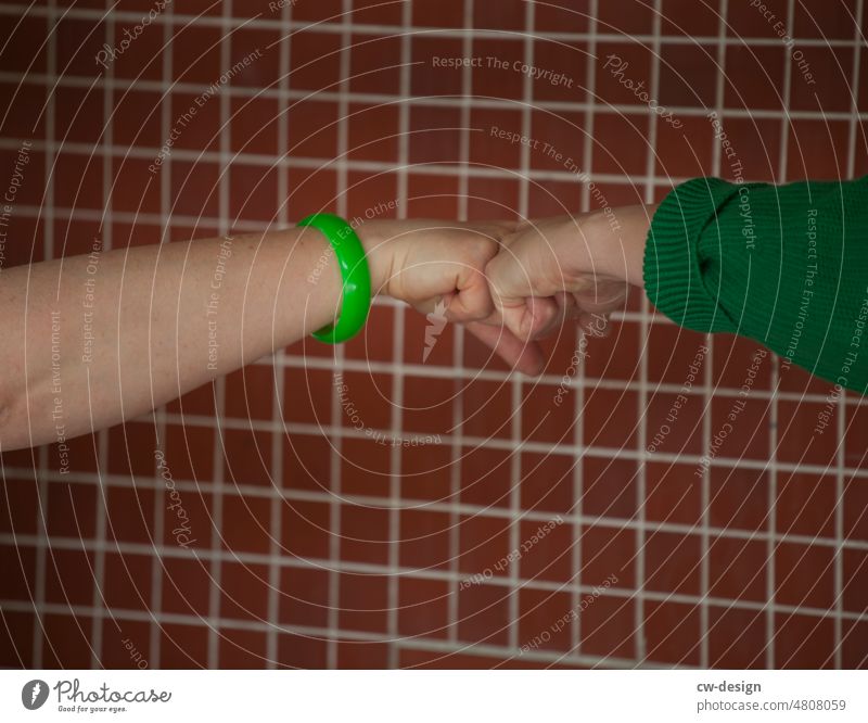 [hansa BER 2022] - Knuckle Knock Arm Hand Human being Skin body part Fingers Palm of the hand wrist Gesture Woman women feminine Green Pattern handshake Welcome