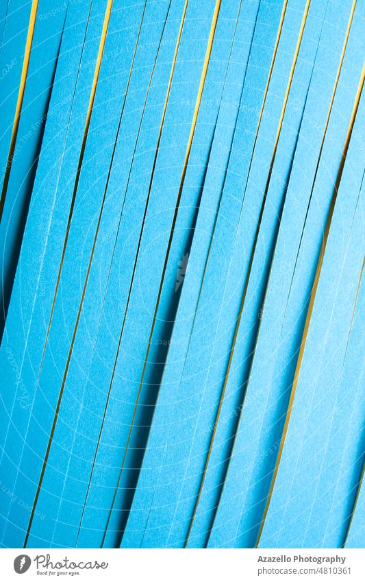 Minimal blue paper strips background. Diagonal paper cuts texture. minimalism diagonal abstract art backdrop bright color colorful concept craft creativity