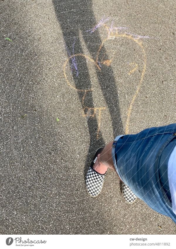 Feet of young man with checkered shoes photographed from above feet Footwear vans Man Chalk drawing Shadow