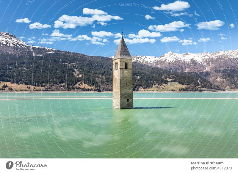 The famous bell. tower in the Lake Reschen, Passo di Resio, Italy passo di resio landscape lake reservoir reschensee reschenpass blue water vinschgau sunken old