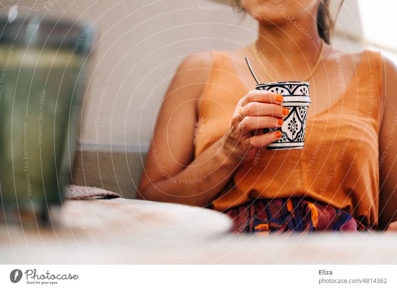 Woman with coffee cup sits outside in cafe in summer Café Summer Coffee cup Sit To have a coffee Table Anonymous warm Coffee break Gastronomy