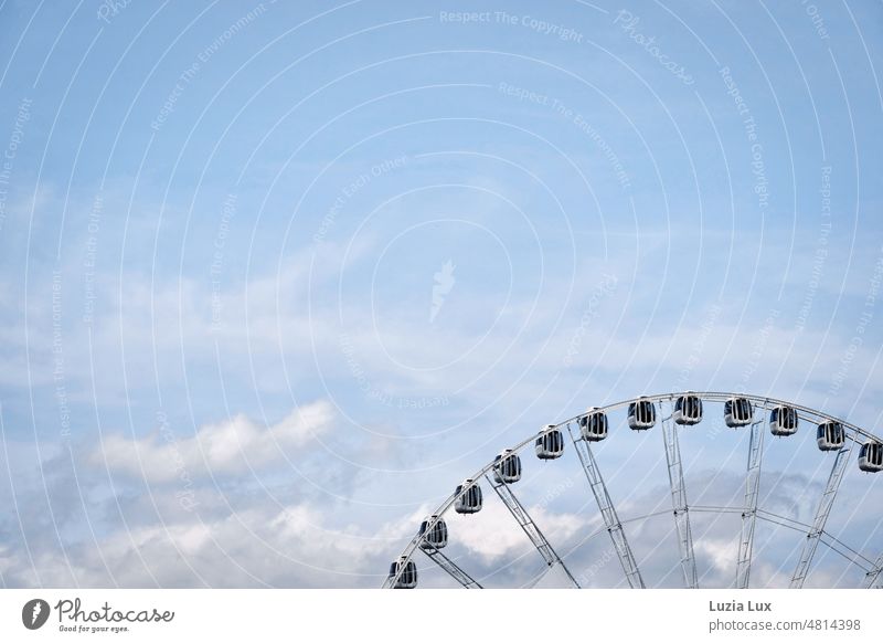 at the top... Ferris wheel cut, against partly overcast sky Fairs & Carnivals Light Sky cloudy Covered Blue Gray Round Tall far up Rotate Joy in hi heaven