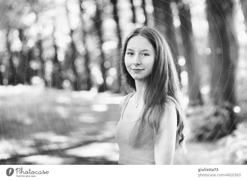 Summer black and white portrait of long haired teenage girl in park Backlight portrait Back-light nature-loving Human being May July youthful Looking