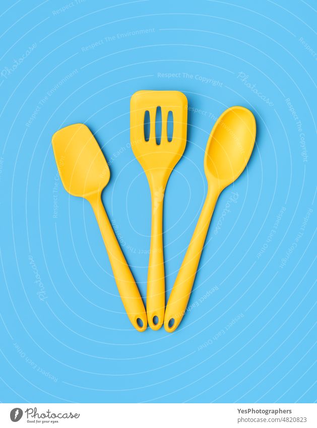 https://www.photocase.com/photos/4820823-silicone-kitchenware-above-view-yellow-kitchen-utensils-on-a-blue-table-dot-photocase-stock-photo-large.jpeg