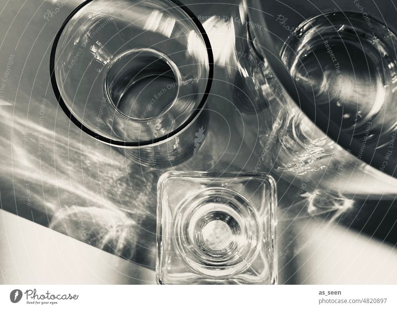 Still life with glass bottles Black & white photo White reflection Reflection Light Shadow Deserted Contrast Bird's-eye view Still Life Style Circle circularly