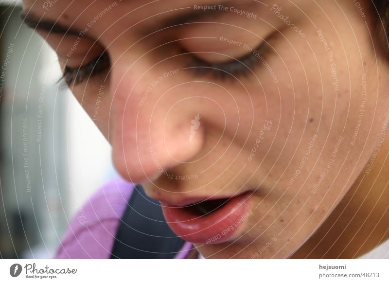 Young woman remembering Woman Think Lips Curved Damp mouth opened Close-up cut out head Youth (Young adults) background slightly blurred excerpt portrait
