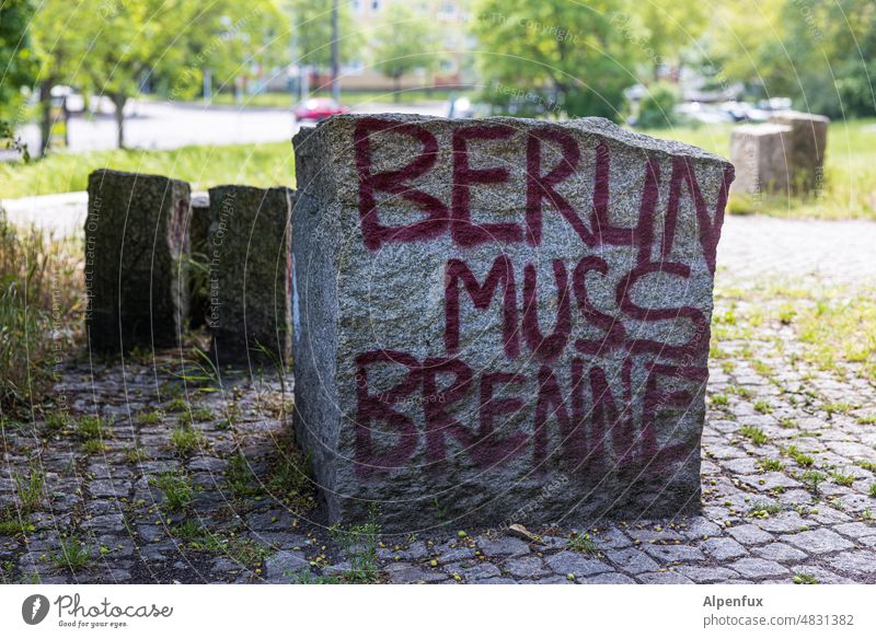 Berlin must burn embassy Characters Stone Letters (alphabet) writing Text Word invitation Deserted Communication Colour photo Exterior shot Park People's Park