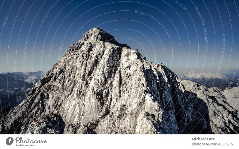 Man climbing on Watzmann central peak Berchtesgaden alps bavaria germany hiking morning mountaineer people sommer summer wandern Überschreitung Südspitze Gipfel