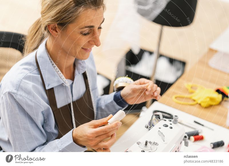 Dressmaker Royalty-Free Images, Stock Photos & Pictures