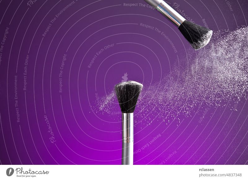 powderbrush on purple background beauty care cheeks color color picture cosmetics drogerie dust dusty elegance eye eyes face fashion female float fly glamour