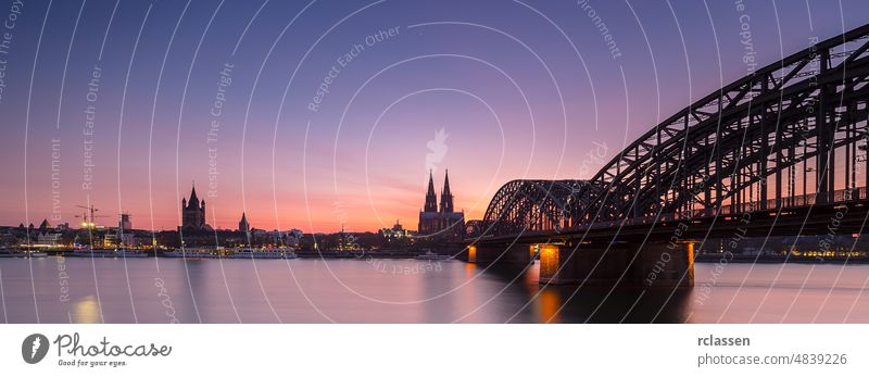 panoramic view of cologne skyline at sunset city cologne cathedral old town Cathedral Rhine Hohenzollern Germany dom river carnival kölsch church bridge europe