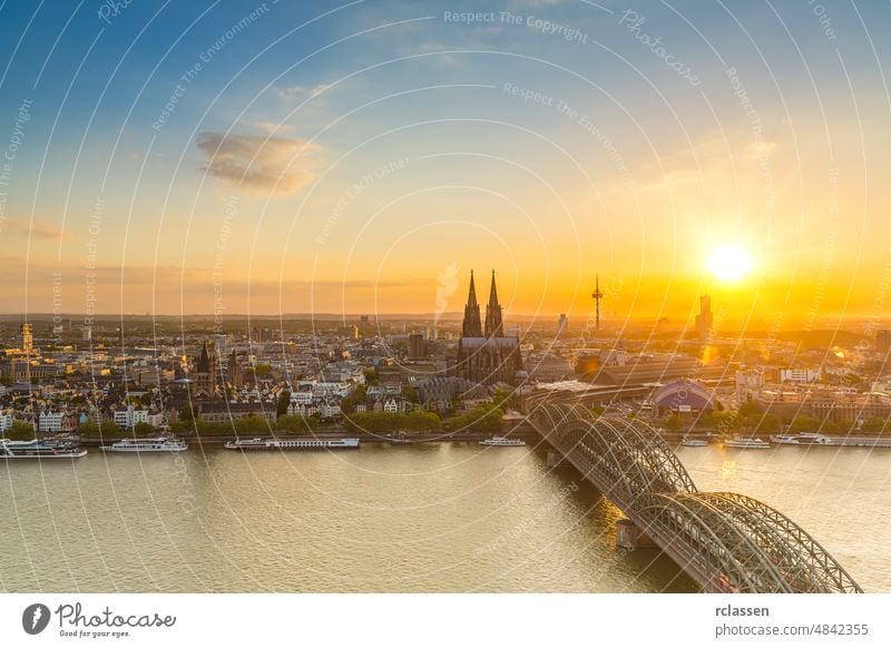 Cologne in Germany with the cathedral at sunset cologne city cologne cathedral old town Cathedral Rhine Hohenzollern bridge dom river carnival kölsch church