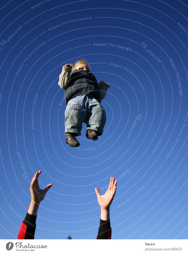 Child to give away Baby Hand Catch Trust Throw Sky Flying