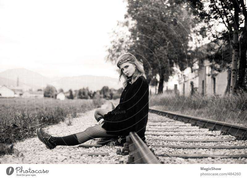 When's the train to take me away...? Young woman Youth (Young adults) 1 Human being Think Wait Beautiful Black Nostalgia Grief Railroad Railroad tracks Sit