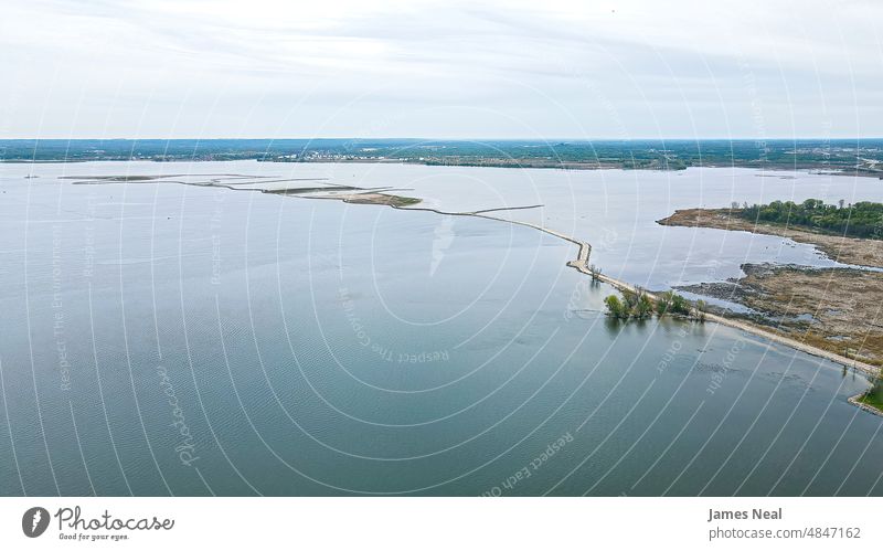 Spring day along outer edges of the bay of water horizon sunny sand color peaceful nature abstract beauty lake background summer beach wisconsin outdoors