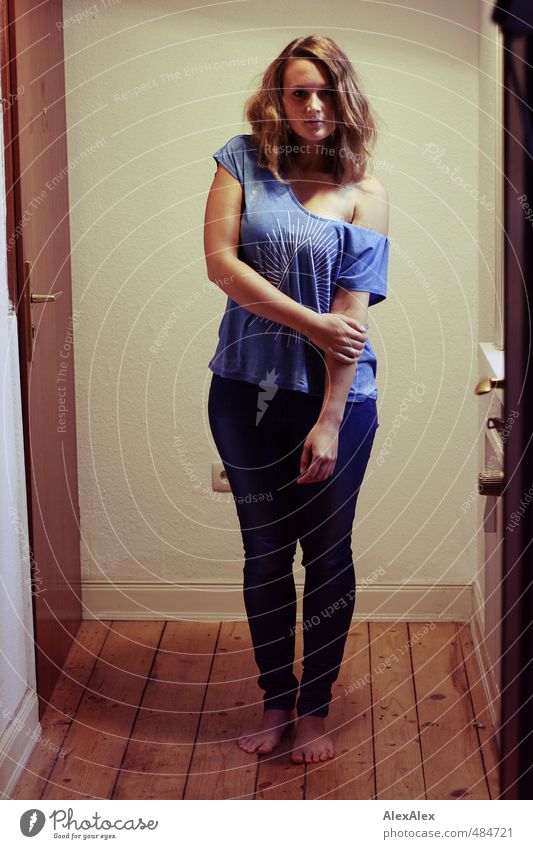 hipster queen!- young woman stands barefoot in a hallway Young woman Youth (Young adults) Body feet 18 - 30 years Adults Hallway Floorboards T-shirt Jeans