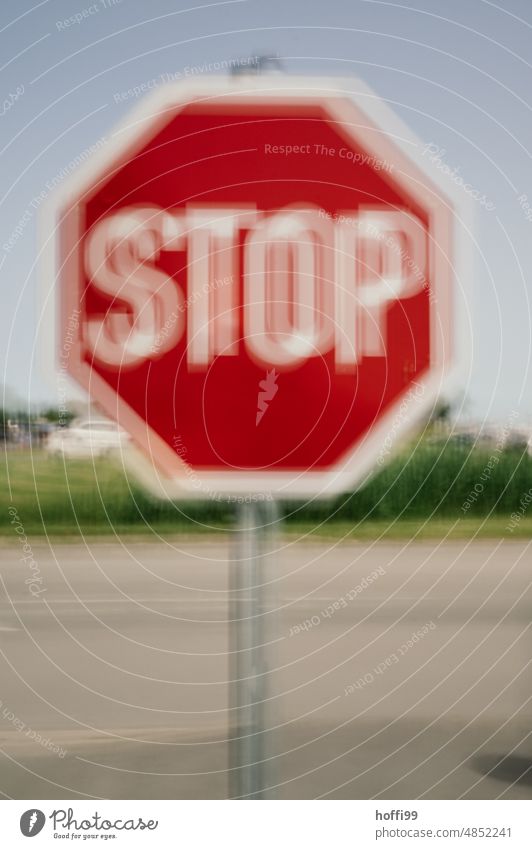 blurred blurred stop sign Stop signal Road sign Signs and labeling Signage Red Hold Dangerous Warning sign ICM ICM technology abstract photography Unclear