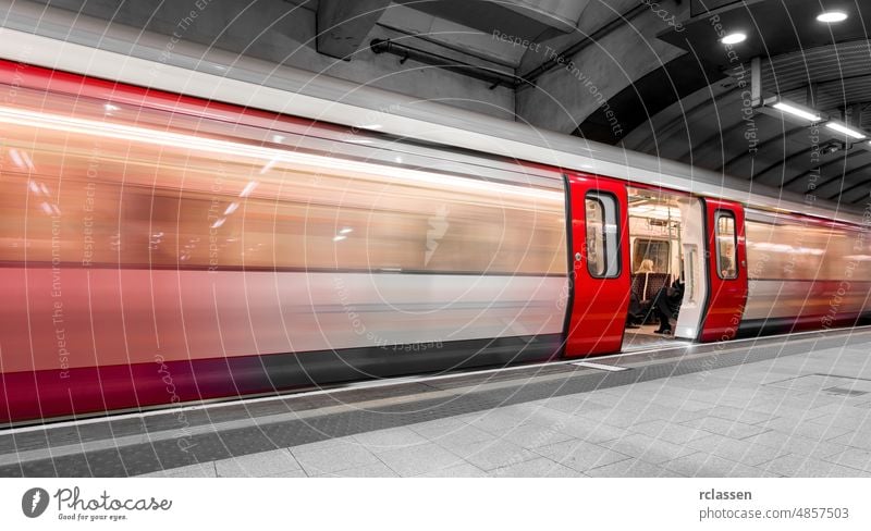 London Underground, Tube Station, train opening the door motion blur underground station travel fast traffic move transport England Great Britain Subway red