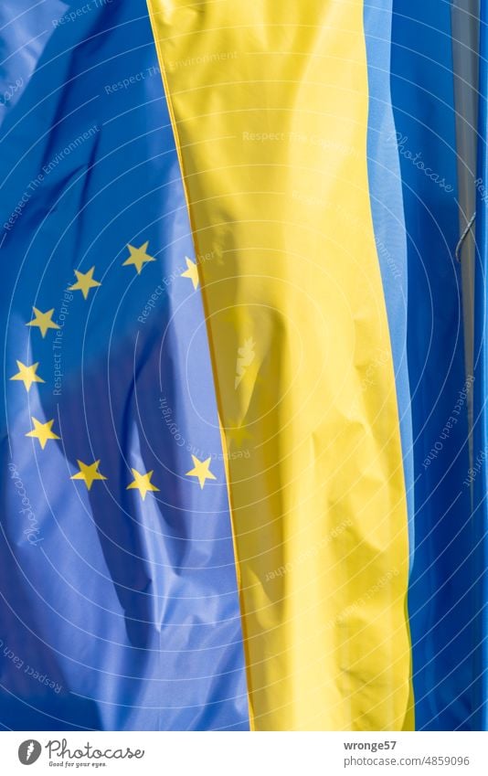 European flag and the Ukrainian flag side by side Side by side blowing side by side Hanging side by side Flagpole flag bearer Suspended EU accession