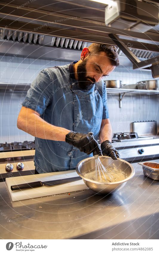 Chef Whipping Flour In Mixing Bowl In Kitchen Counter Restaurant Whisk Dough Cooking Batter Ingredient Food Preparing Meal Fresh Standing Industrial Occupation