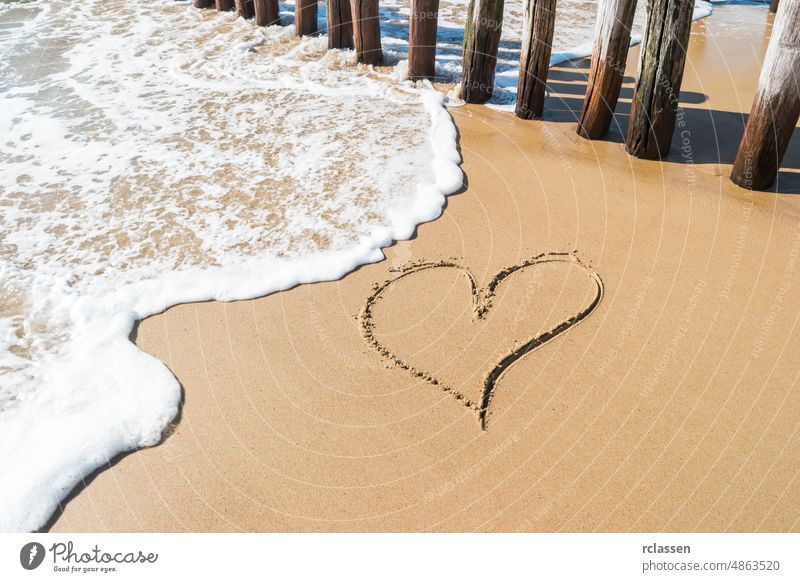 Heart drawn on the sand in Zeeland, Holland domburg netherlands zeeland holland dutch europe sylt sea beach holidays water coastal waves travel vacation tourism