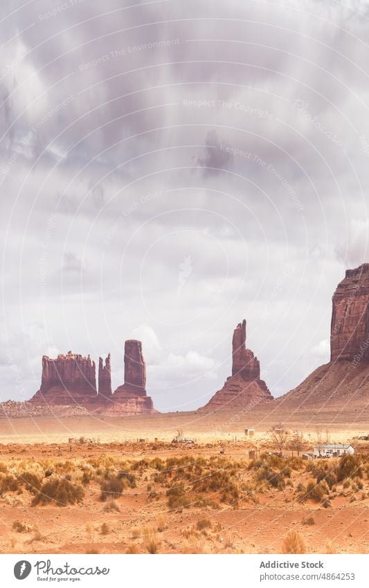 Scenic from above view of mountain cliffs utah Arizona national park landscape Monument Valley cloudy travel butte rocky outcrop Navajo Tribal Park desert usa