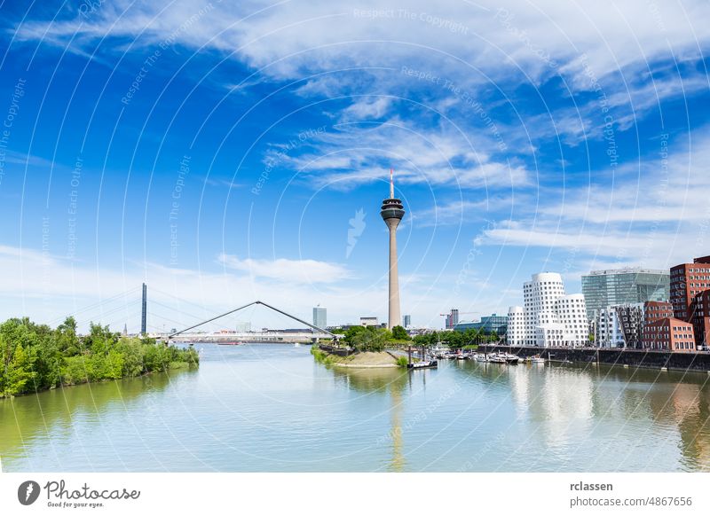Cityscape of Dusseldorf in a sunny summer day dusseldorf germany tower river europe city rhine panorama architecture medienhafen harbor media harbor