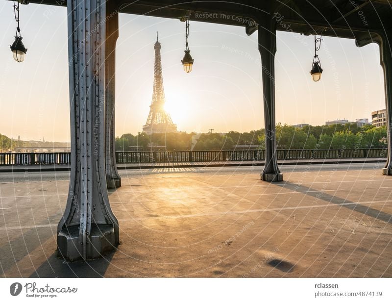 Eiffel tower view at sunrise at the Bir-Hakeim bridge, Paris. France paris eiffel landmark france skyline europe summer lantern seine travel sunset romantic