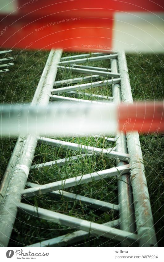 Scaffolding, dreaming of doing nothing Lattice girder Scaffolding element Lie Meadow barrier tape cordon Construction site construction got laid filed Grass