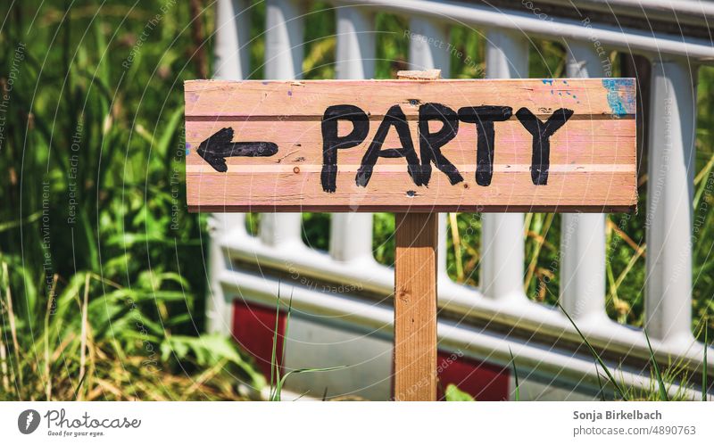 Where is the party? Sign for fun :) Sign homemade as a signpost to the garden party Party Road marking Clue self-written Firm Orientation Direction Arrow