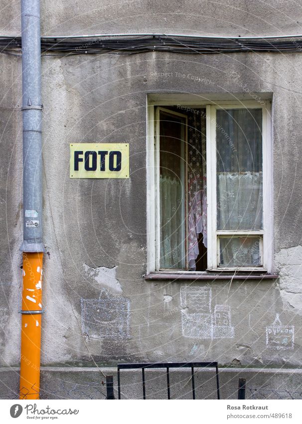 A photo is a photo. House (Residential Structure) Outskirts Wall (barrier) Wall (building) Window Concrete Signs and labeling Graffiti Line Old Esthetic Dirty