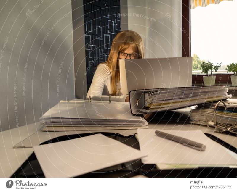 A woman at work behind mountains of files Office Office work Woman Business Workplace Success Education Work and employment Document Rack bureaucracy
