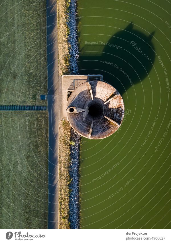 Overflow at the reservoir in Hesse - I see the shadow of a cat's head Crack & Rip & Tear Desert Drought Weather heating Surface Summer Hot Brown Ground Pattern