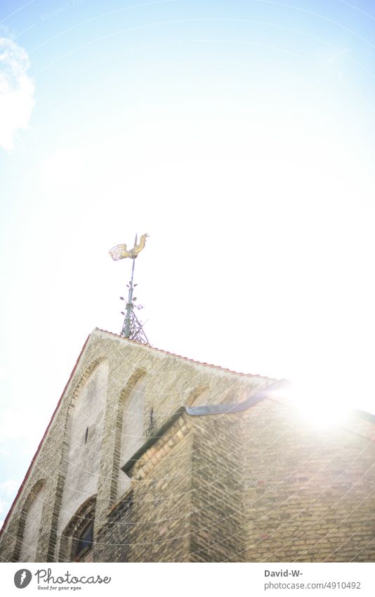 Church is illuminated by the sun Sunbeam Sunlight Religion and faith Light (Natural Phenomenon) Church spire Sky Rooster
