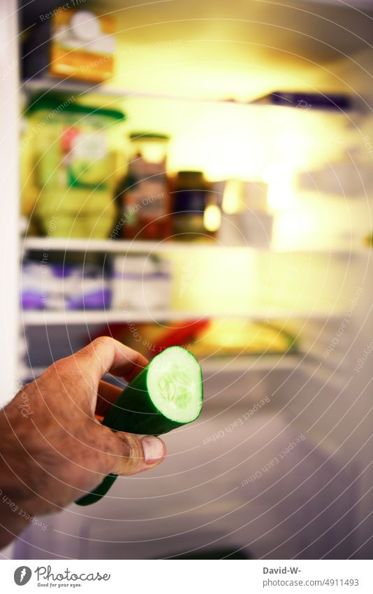 Take vegetables on the refrigerator Vegetable Healthy Eating Icebox Grasp Diet Hand Cucumber salubriously Delicious vitamins Vegan diet vegetarian vegan