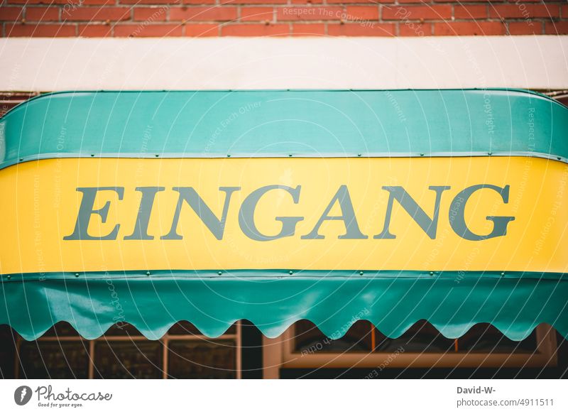 Entrance - inscription in retro colors in front of a building Retro Word Load Building Appealing Past House (Residential Structure) Transience entrance sign