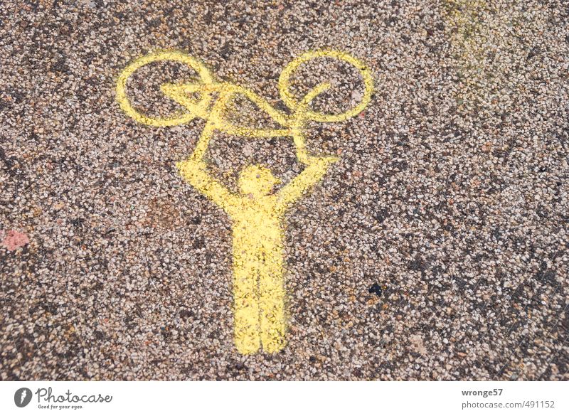 wheel carrier Cycling Bicycle Sign Graffiti Carrying Town Human being Wheel Symbols and metaphors bike rendezvous Demand Dye Yellow Pavement Street