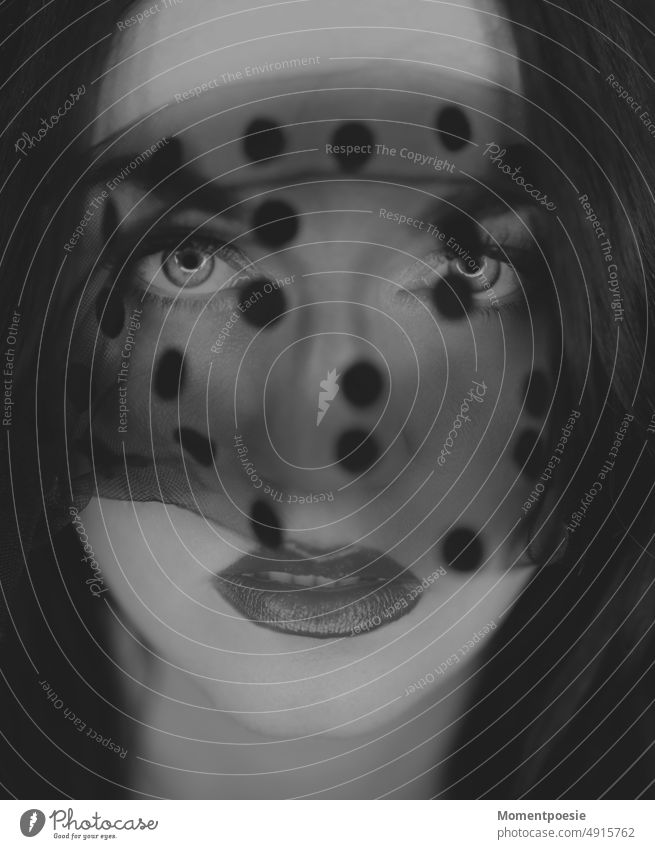 Woman's face behind veil with dots Vail points Black Face of a woman pretty black-and-white Spotted Grief mystery sexy sensual Mysterious Mystic covert
